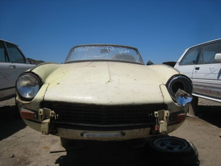 Illustration for article titled Junkyard Jackpot: BMW 2002, Corolla GT-S, Triumph Spitfire